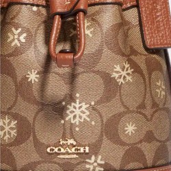 Coach Women Dempsey Drawstring Bucket Bag 15 in Signature Canvas with Snowflake Print